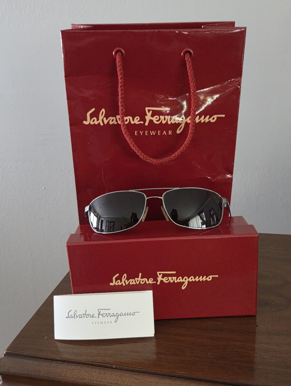 Salvatore Ferragamo Silver Frame Sunglasses with Black Lenses